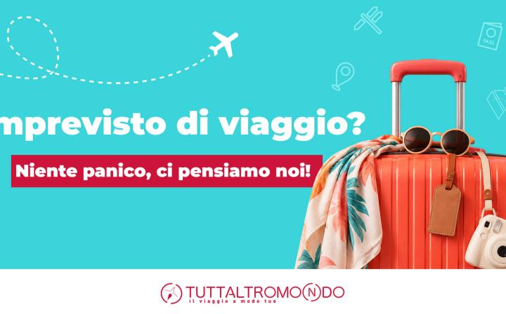 Valigia rossa da viaggio con scritta "Imprevisto di viaggio? Niente panico, ci pensiamo noi!" e logo Tuttaltromo(n)do.